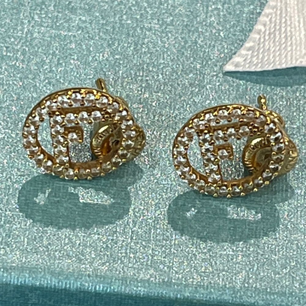 Fendi F is Fendi Gold Tone Crystal Pave Logo Stud Earrings Made in Italy